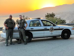 Gates Security officers car sunset