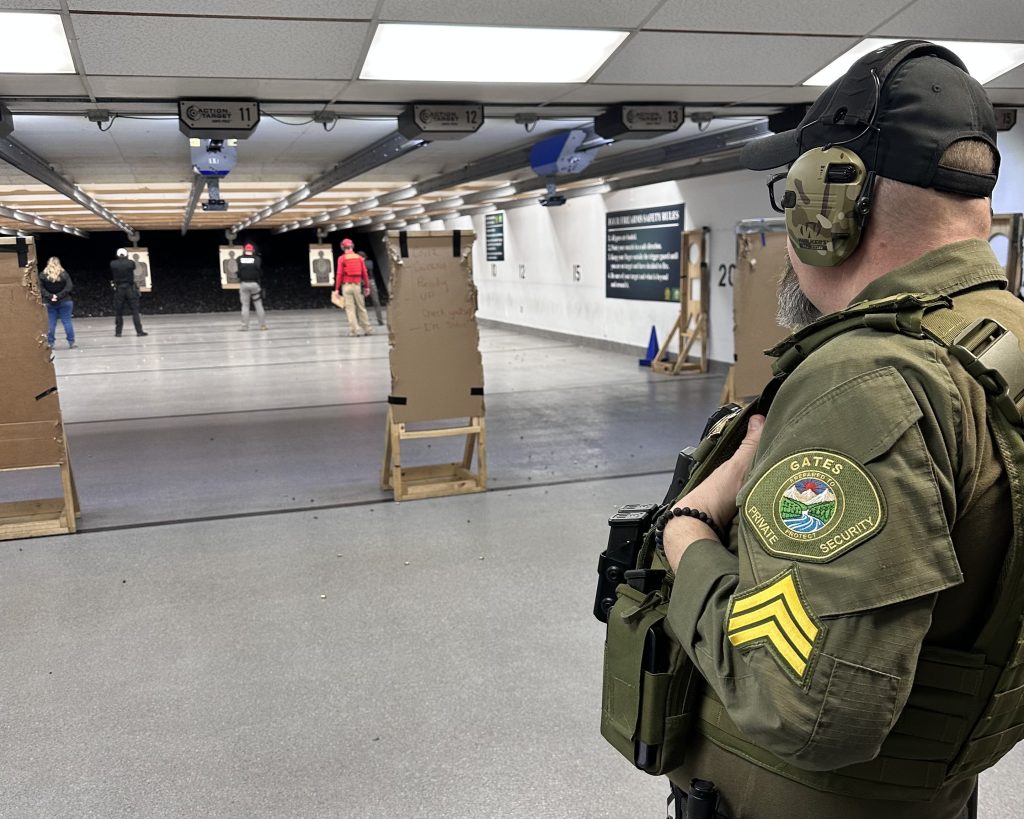 Security Training at an indoor gun range.